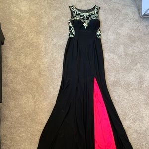 Woman’s Betsy Admas Rhinestones Mermaid style Gown